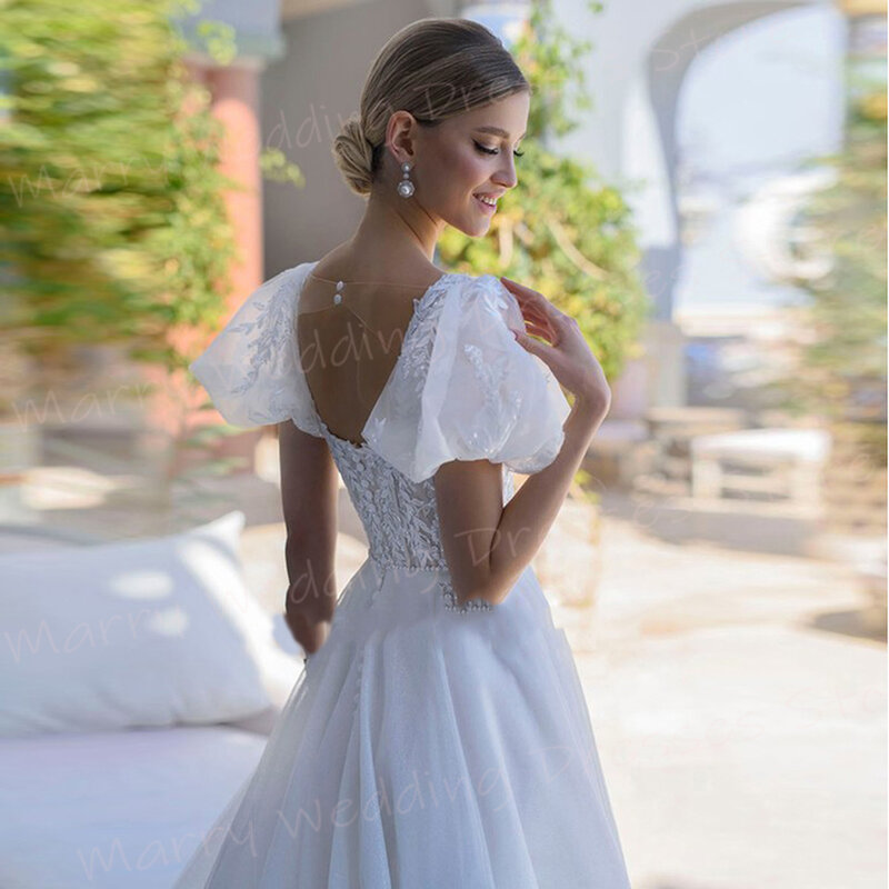 Romantyczne urocze damskie suknie ślubne z wdziękiem aplikacje koronkowe nowe kwadratowy kołnierzyk suknie ślubne na guziki Mariage Femme