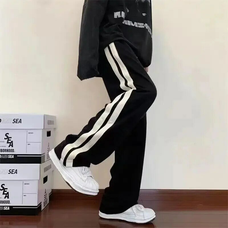 Pantaloni a gamba larga moda coreana pantaloni larghi Casual a righe a vita alta Hiphop pantaloni dritti con tasca elastica in vita