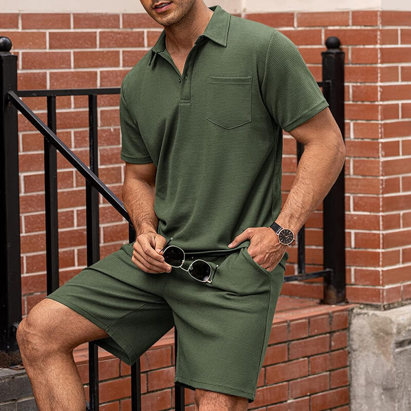 Vintage kerah rebah pria kemeja Polo dua potong setelan musim panas lengan pendek atasan dan celana pendek pakaian pria kasual warna murni