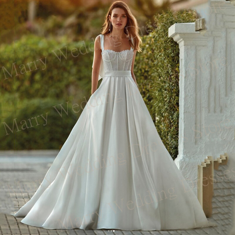 Modern Simple Sweetheart A-Line Wedding Dresses With Pockets Bow Sleeveless Beads Satin Bride Gowns Backless Button Sweep Train