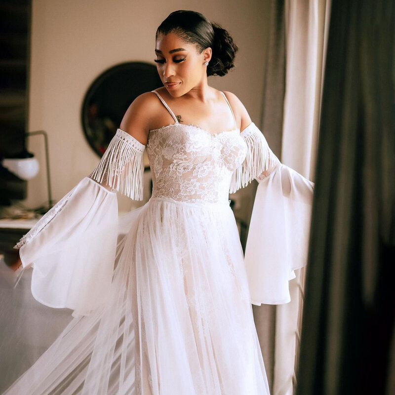 Abnehmbare lange Flare Ärmel Dubai Brautkleider Rüschen Saum Spitze Unterlage Quasten Korsett zurück Luxus Arabisch modernes Hochzeits kleid