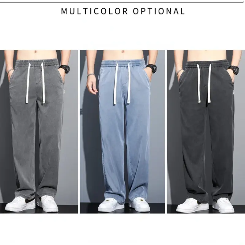 Letnia miękka tkanina z lyocellu męskie dżinsy cienkie luźne proste spodnie ze sznurkiem elastyczna talia koreańska spodnie typu Casual Plus Size