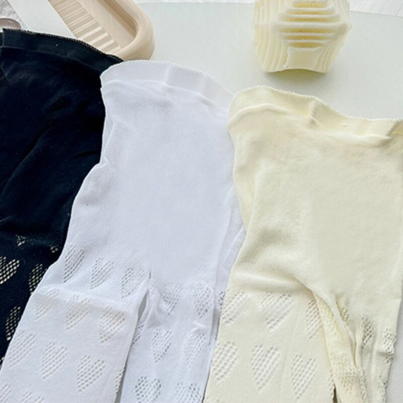 Calze per bambini maglia tinta unita cuore Lolita estate calze stile coreano collant per bambini Leggings per bambini collant per ragazze