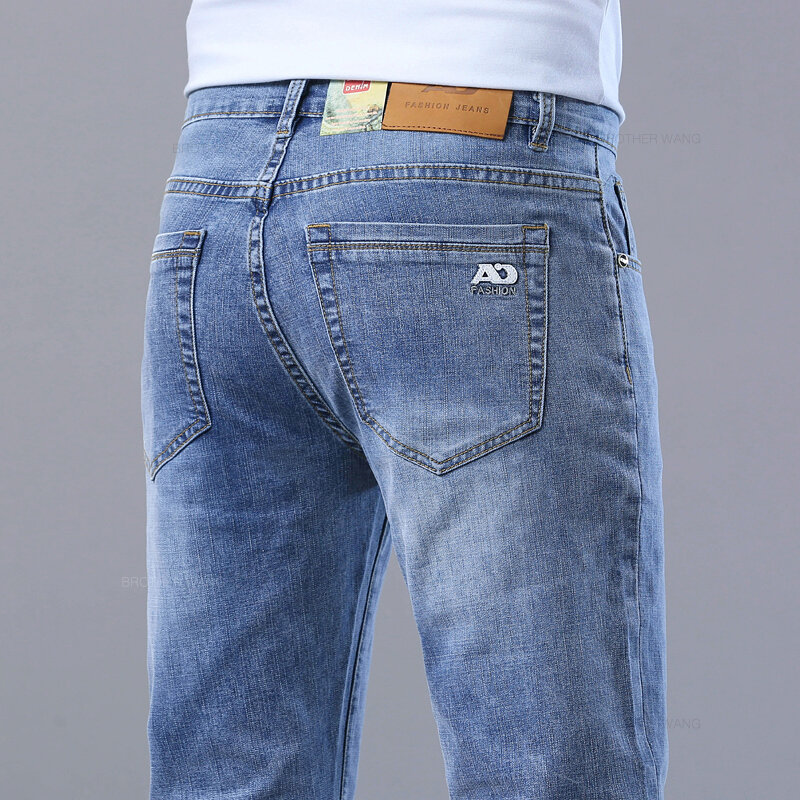 Celana Jeans ramping tipis pria, celana Denim kain melar kasual bergaya biru muda musim panas dan semi klasik asap abu-abu