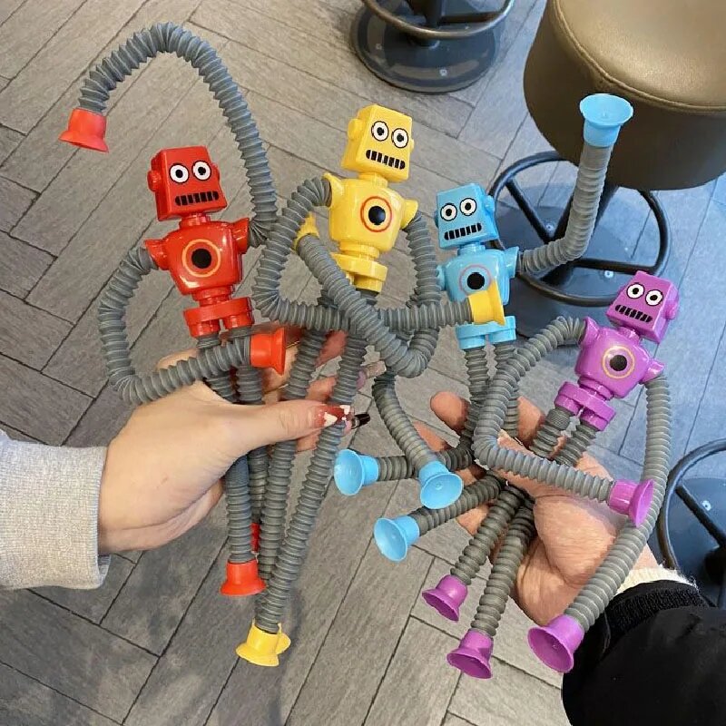 Brinquedo telescópico do robô dos desenhos animados para crianças, quebra-cabeça versátil, esticando ventosa, redução de pressão e brinquedos calmantes, 4pcs