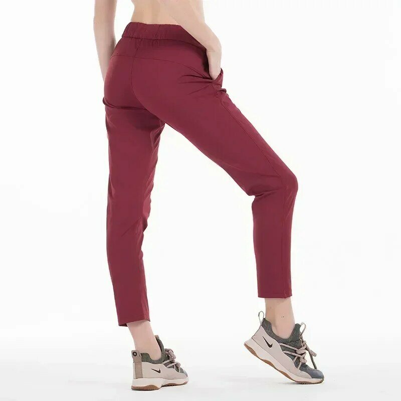 Lulu-Pantalon de yoga à la mouche pour femme, leggings d'entraînement, tissu commandé à 4 voies avec poches latérales, collants de sport en plein air