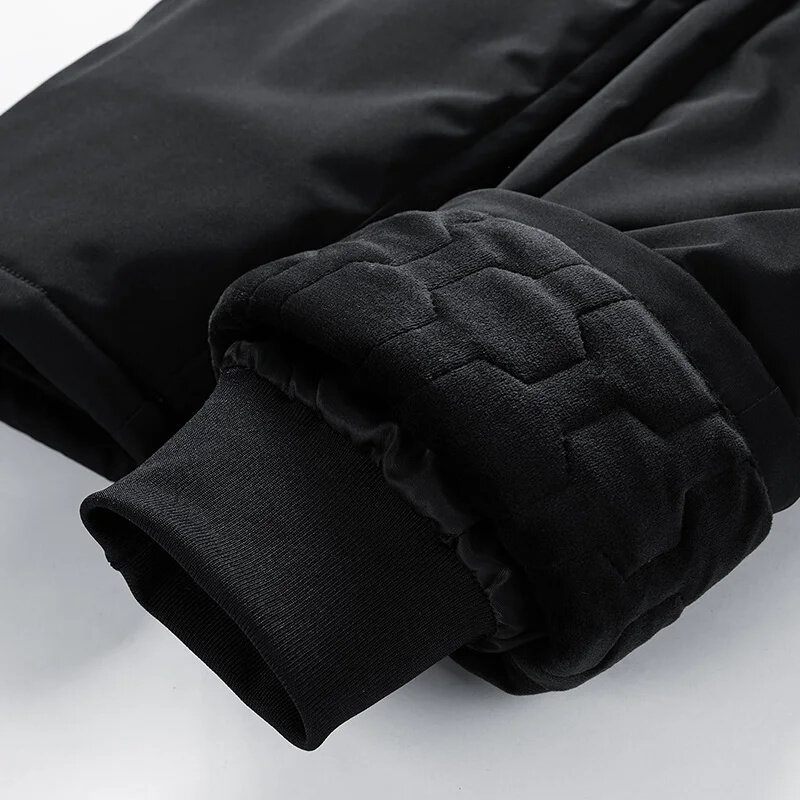 Pantalones de chándal cálidos impermeables a prueba de viento para hombres, pantalones ajustados casuales de talla grande 7XL, pantalones gruesos forrados de lana negra, Invierno