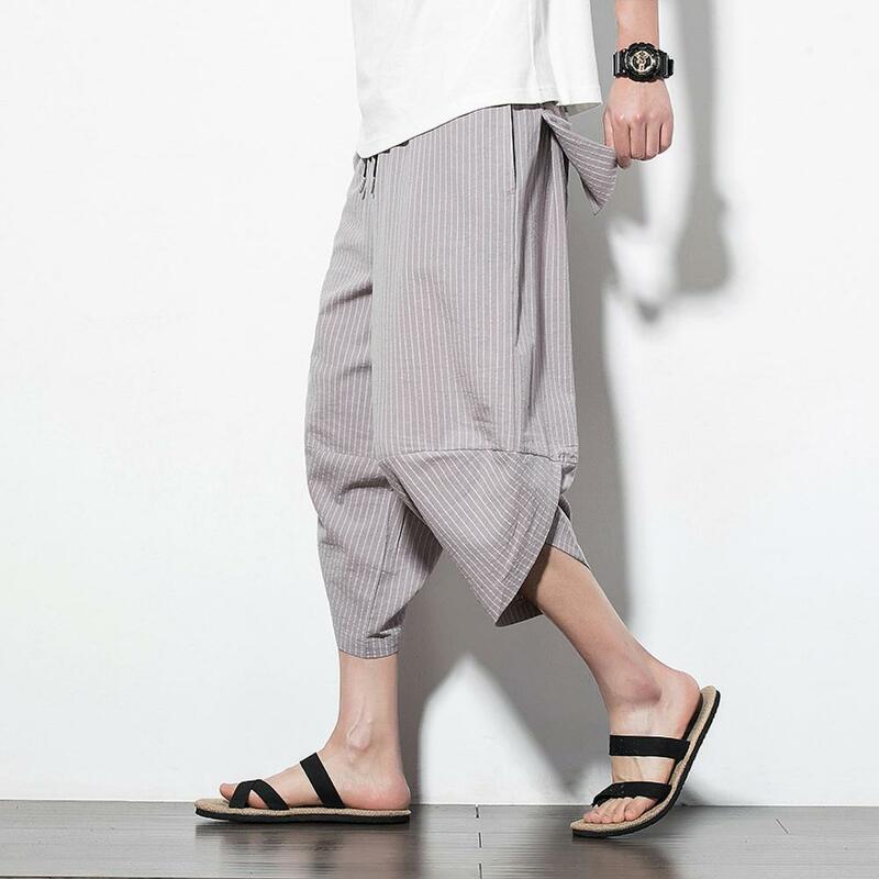Calça masculina com ajuste solto, cintura com cordão elástico, estampa listrada vertical, calça harém, streetwear, verão