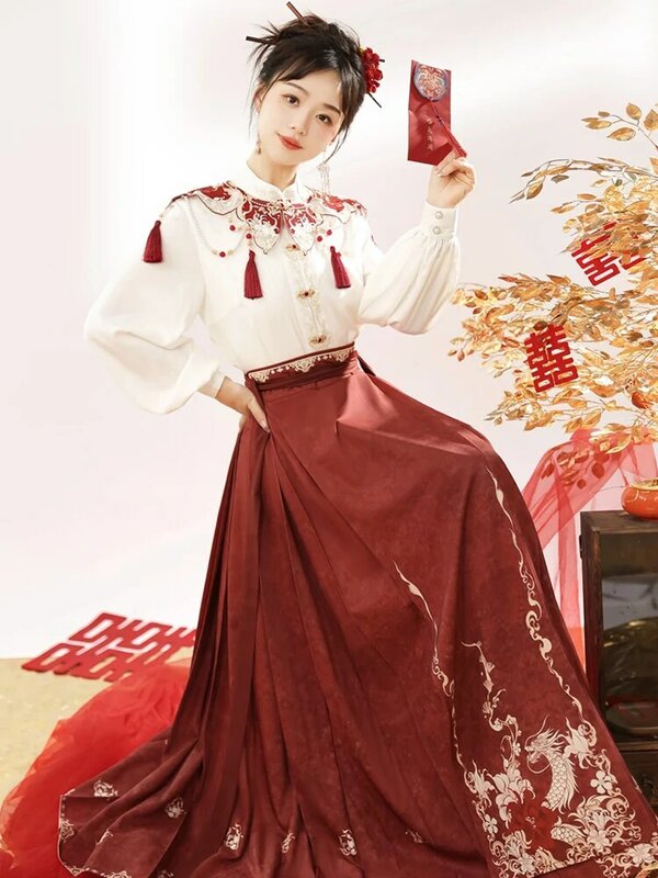 Chinese original Hanfu female improved Han elements shirt horse skirt cloud shoulder suit red engagement Chinese New Year daily