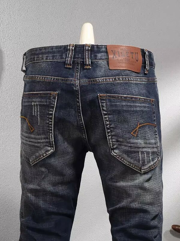 Nowo designerskie modne dżinsy męskie wysokiej jakości Retro ciemnoniebieskie elastyczne dopasowane porwane jeansy męskie spodnie spodnie dżinsowe Vintage
