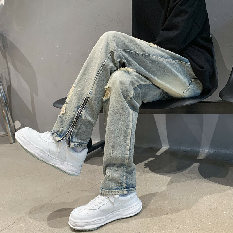 Amerykański Retro jeansy w stylu Distressed męska letnia cienka konstrukcja główna ulica modna markowa odzież męska z rozciętym spodnie z zamkiem