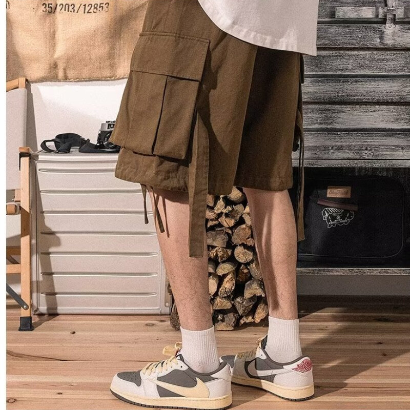 Szorty Cargo mężczyźni z kieszeniami workowate, dopasowane styl japoński szykowna, wysoka uliczne do kolan Harajuku moda lato prosta nowa uczelnia