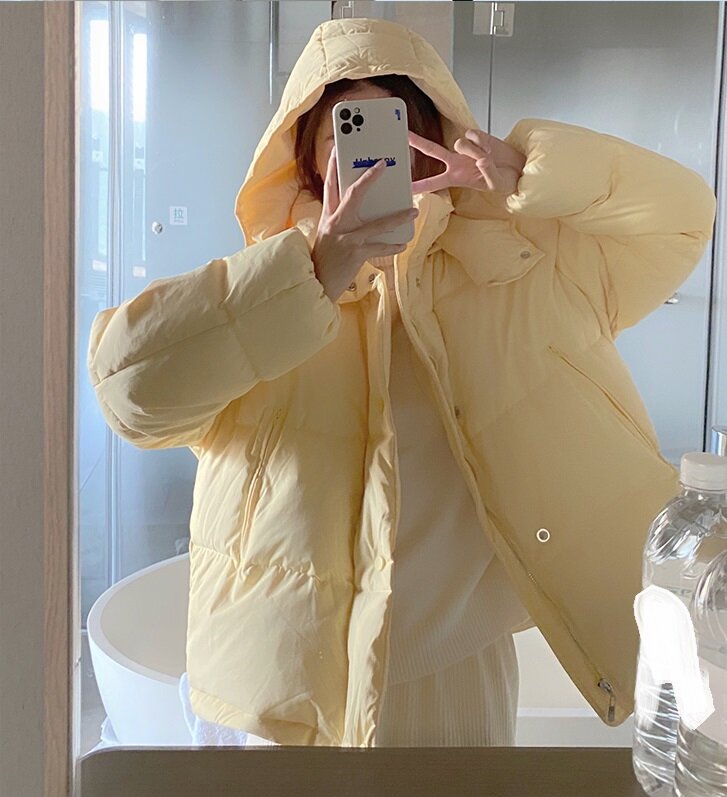 Puchowa kurtka bawełniana, damska krótka, mała figura, 2023 zimowa nowa kremowy żółty pikowana kurtka z kapturem, bawełniana kurtka, trend studencki