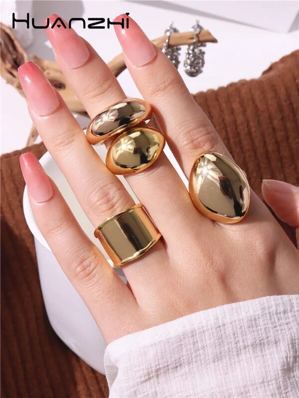 HUANZHI 2020 NEW Exaggeration Punk Water Droplets Distortion Irregular Wide Version Gold Color Ring For Women Party Jewelry
