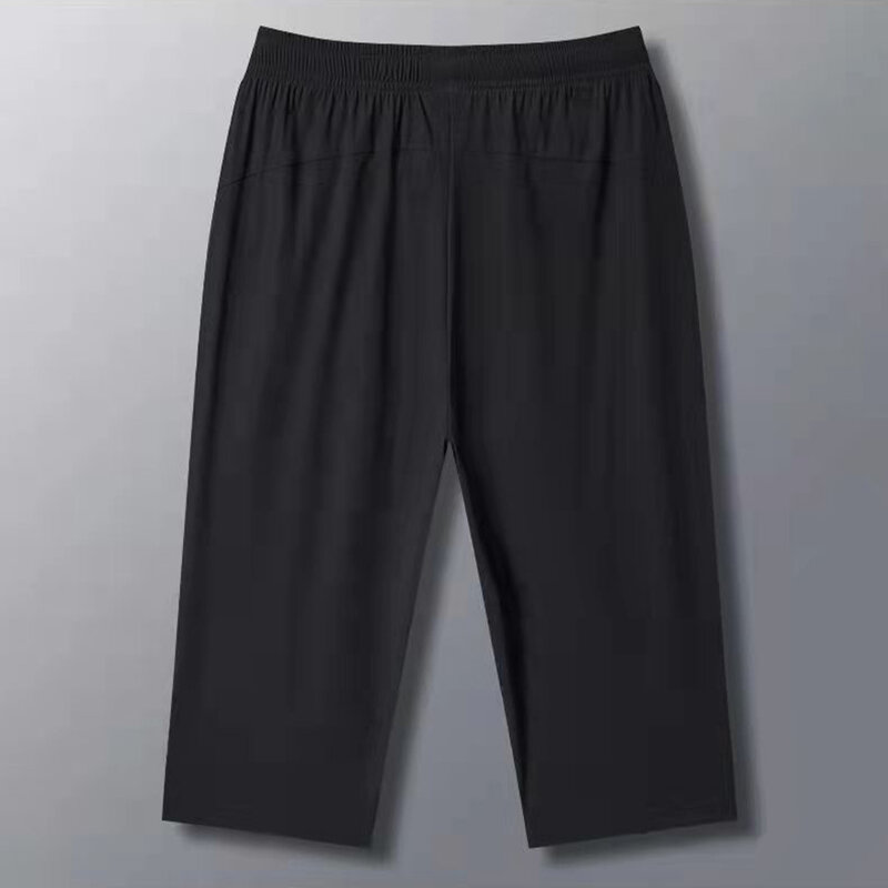 Pantaloni corti sportivi traspiranti larghi da uomo vendita di liquidazione Drop shipping
