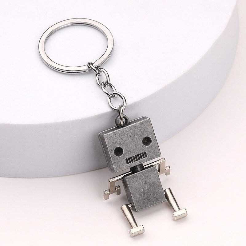 1Pc Schattige Mini Robot Auto Sleutelhanger Creatieve Retro Beweegbare Legering Auto Sleutelhanger Voor Mannen Punk Tas Ornamenten Sleutel Accessoires