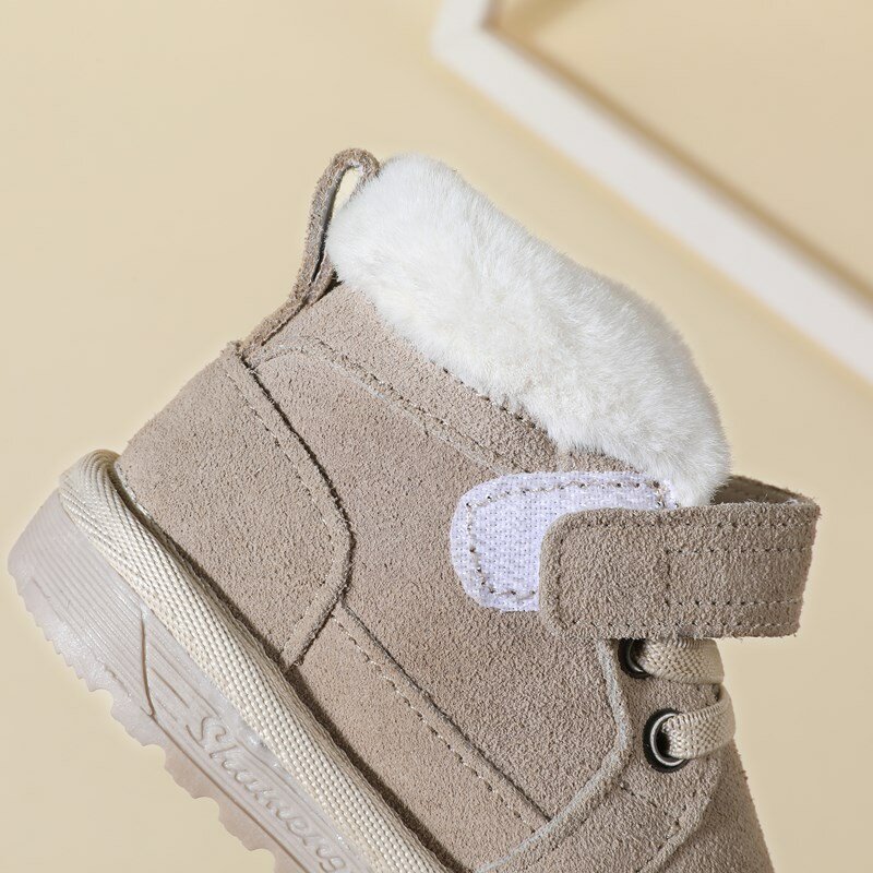 ใหม่ฤดูหนาวหิมะรองเท้า Unisex น่ารักหนังเด็กหญิงเด็กชายรองเท้าผ้าฝ้ายเด็กรองเท้าผ้าใบนุ่มด้านล่างเด็กวัยหัดเดินรองเท้าเด็ก