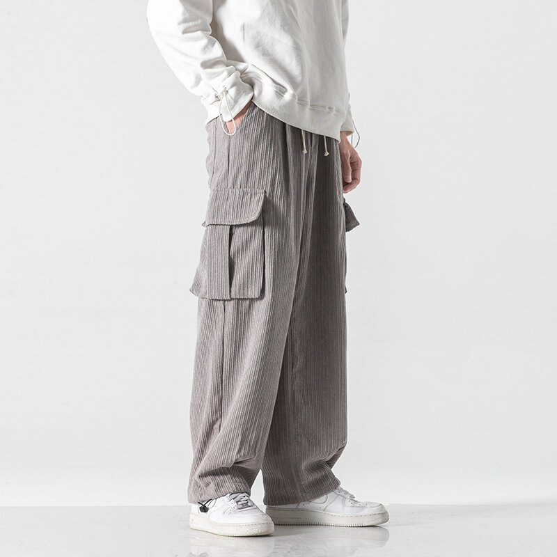 Calças masculinas primavera casual versão coreana veludo macacão de cor sólida rua calças de perna larga tendência tamanho grande calças all-match
