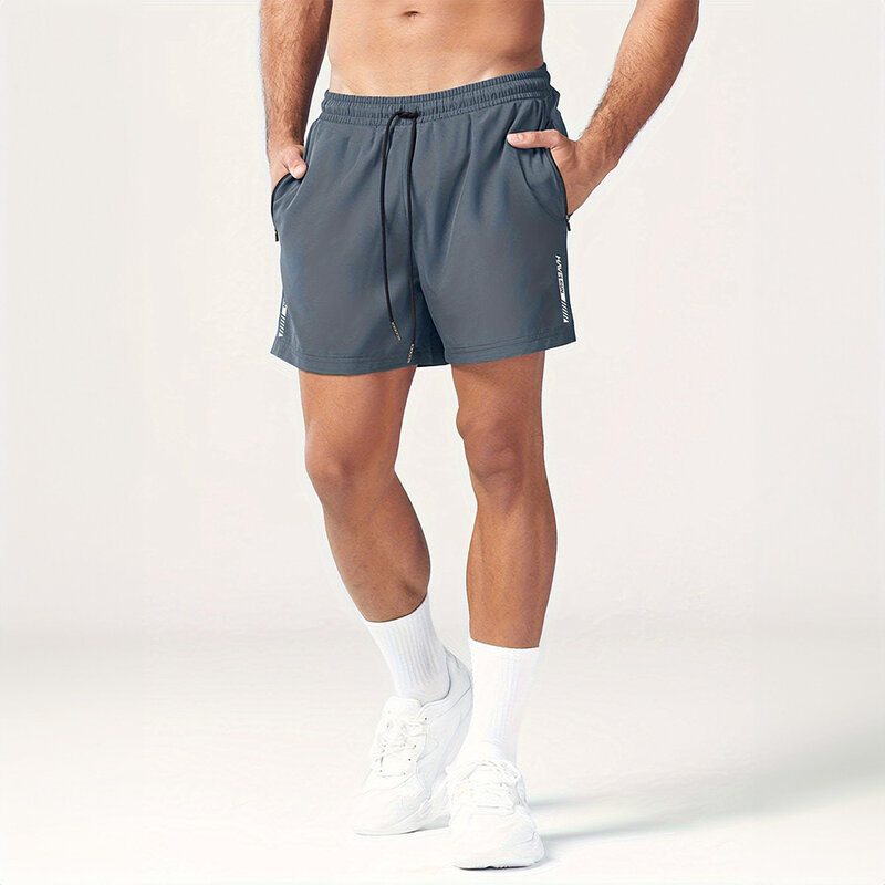 Celana pendek olahraga pria, celana pendek kasual pria bagian tipis bersirkulasi celana pantai basket latihan kebugaran celana lari