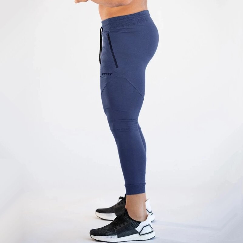 Siłownia chudy spodnie do biegania mężczyzn spodnie do biegania trening kulturystyczny Fitness spodnie do biegania odzież sportowa męska bawełniana spodnie do joggingu
