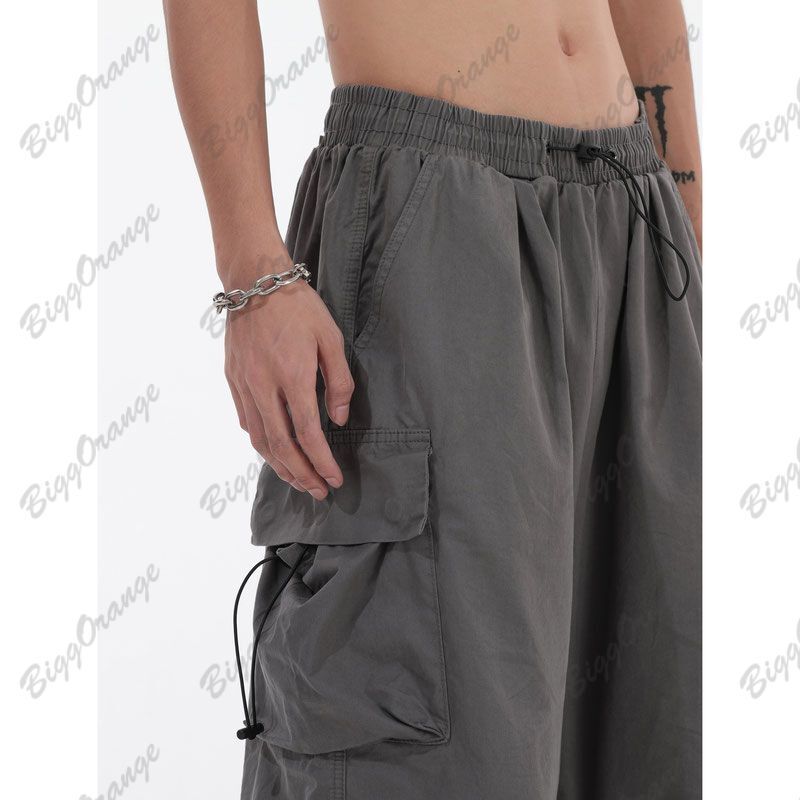 Pantalones de trabajo con bolsillo para hombre, pantalones de Hip Hop, pantalones casuales sueltos con cordón, pantalones de chándal Y2K, diseño de calle alta americana