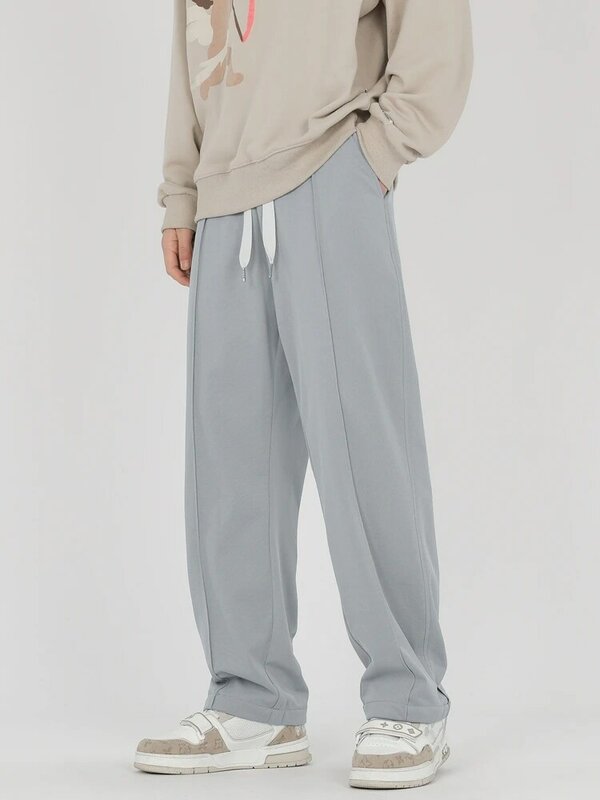 2023 jesienne nowe proste spodnie dresowe męskie koreańska moda sznurek w pasie z dzianiny drapowane spodnie męskie luźne spodnie