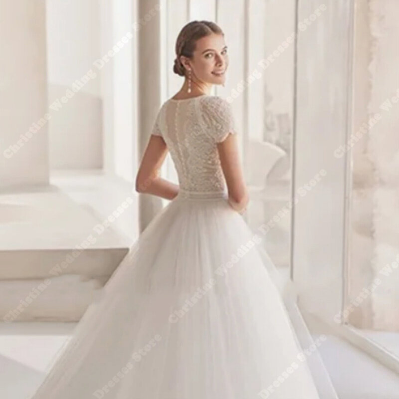 Proste tiulowe puszyste suknie ślubne koronkowe aplikacje paski na ramionach długość do mopowania suknie ślubne z krótkimi rękawami szata na imprezę