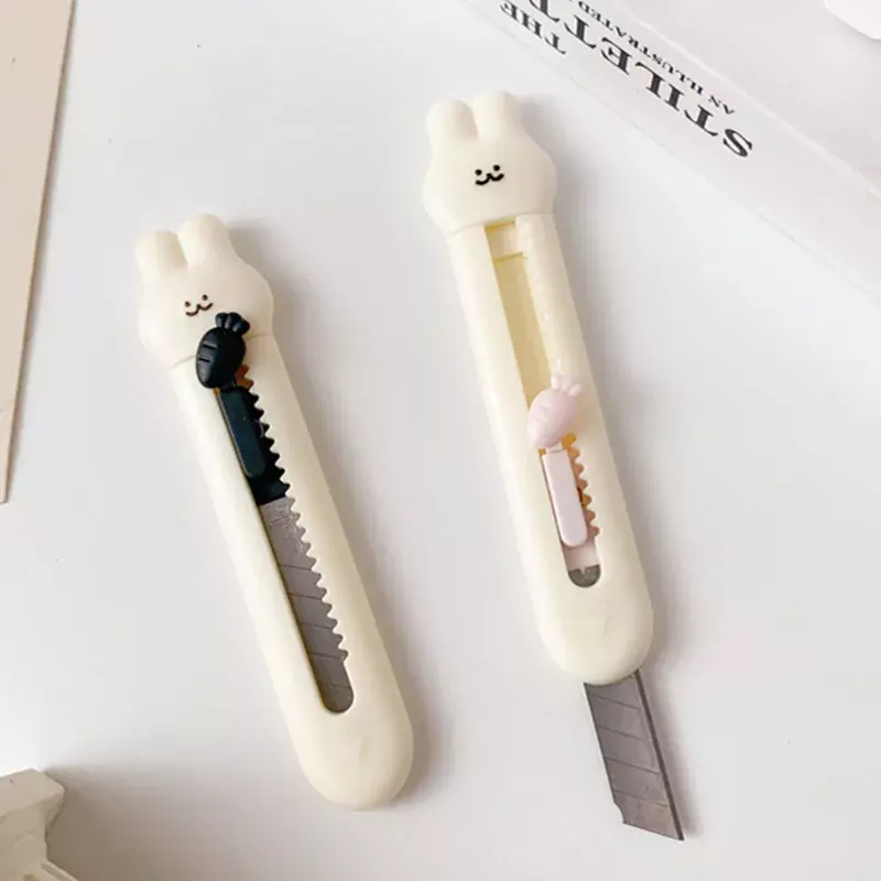 1 buah pisau kecil cantik Mini kotak pemotong kelinci celengan Kawai pisau lipat alat tulis cantik perlengkapan pemotong kertas lucu siswa