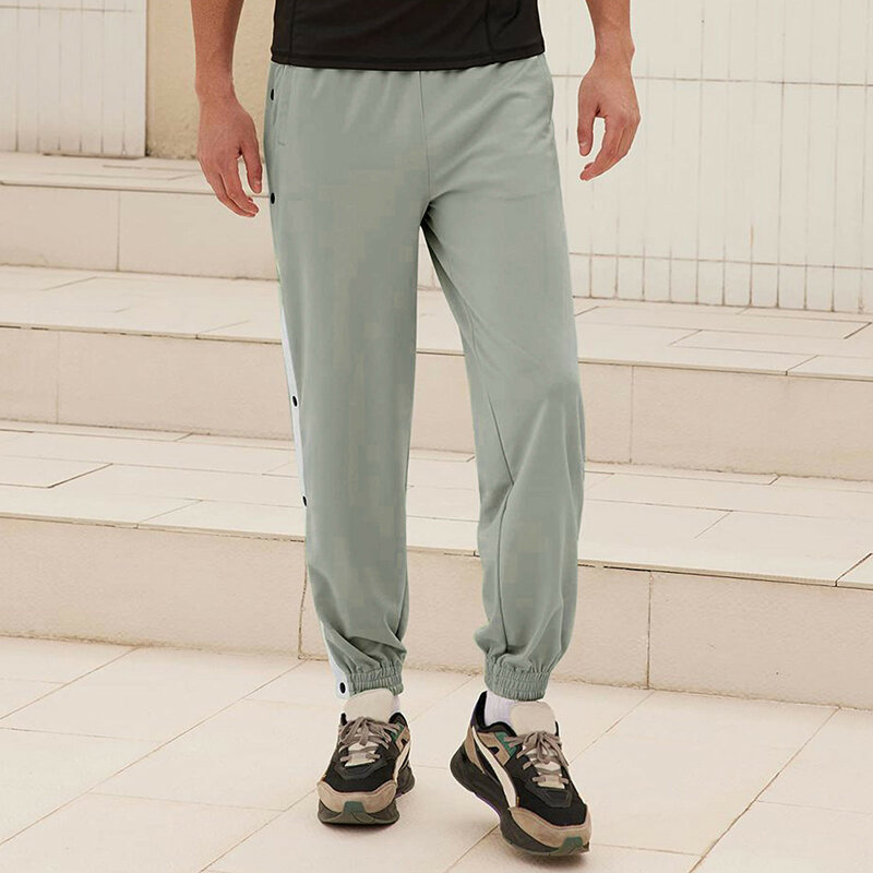 Celana olahraga kasual pria, celana olahraga modis sisi kancing terbuka celana pinggang elastis celana pantalon Hombre