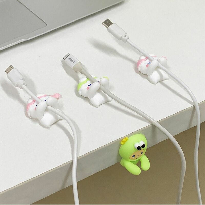 Crochets muraux de fil de ligne de données de chargeur USB de dessin animé Kawaii, support de câble, enrouleur de câble d'écouteur mignon, bureau, 2 pièces