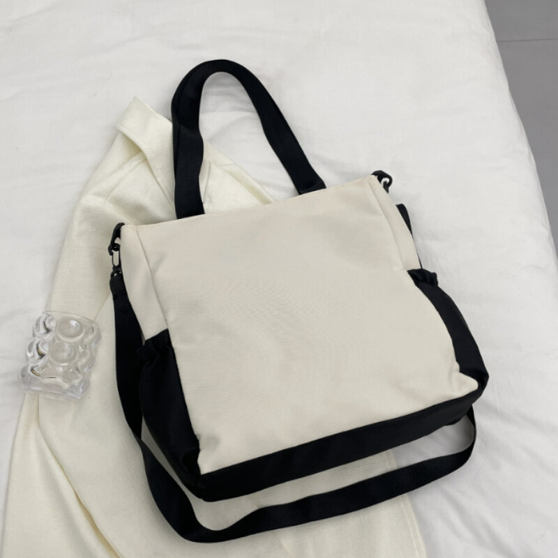 Sanrio tas tangan untuk gadis sekolah, tas selempang kapasitas besar modis dan lucu, tas bahu kasual dan serbaguna untuk wanita