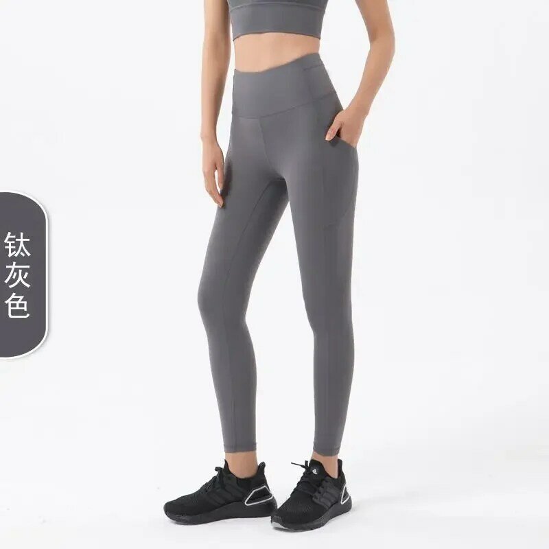 Bolso lateral nu calças de ioga apertadas para mulheres, Europa e América, cintura alta, quadril, pêssego, calças de fitness esportivas