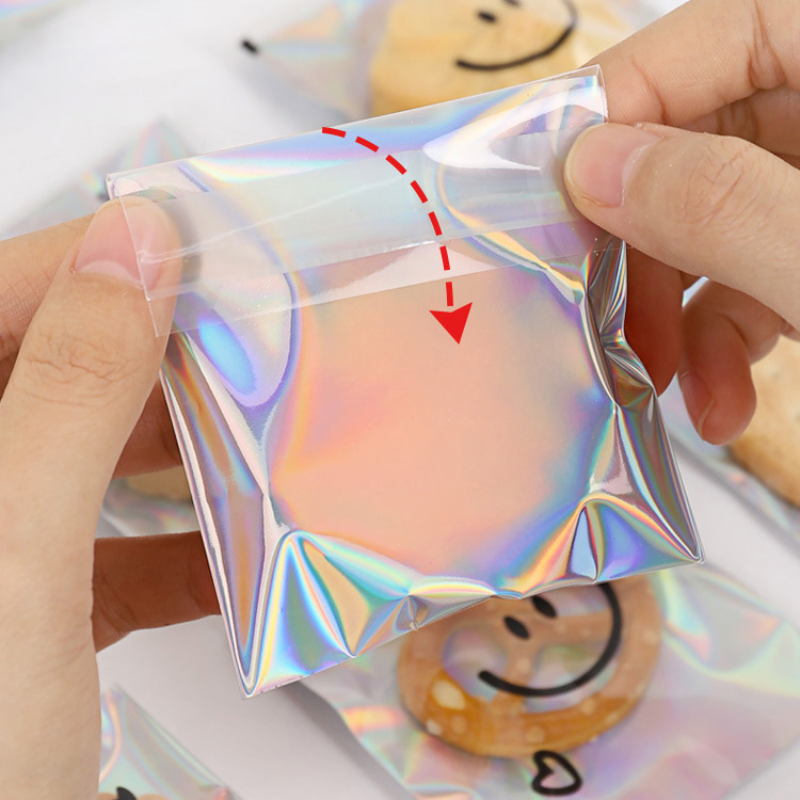 100 stücke Schneeflocke knusprige Keks verpackungs tasche niedliches lächelndes Gesicht selbst klebende Tasche Laser transparente Keks tasche