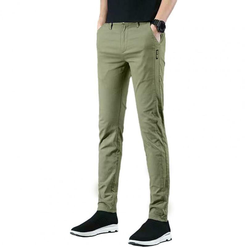Pantalones ajustados con bolsillos para hombre, tela transpirable suave, diseño de cintura media, moda sólida, primavera y otoño