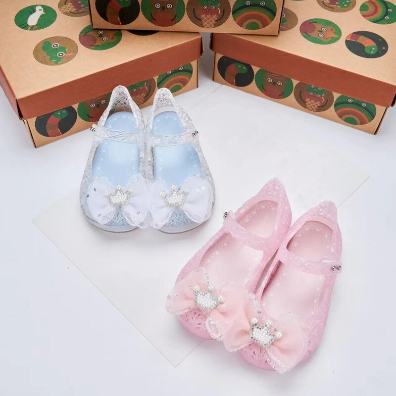 Zapatos de gelatina de cristal para niños, sandalias de playa suaves y fragantes, con lazo y corona de princesa, novedad de 2024, HMI156