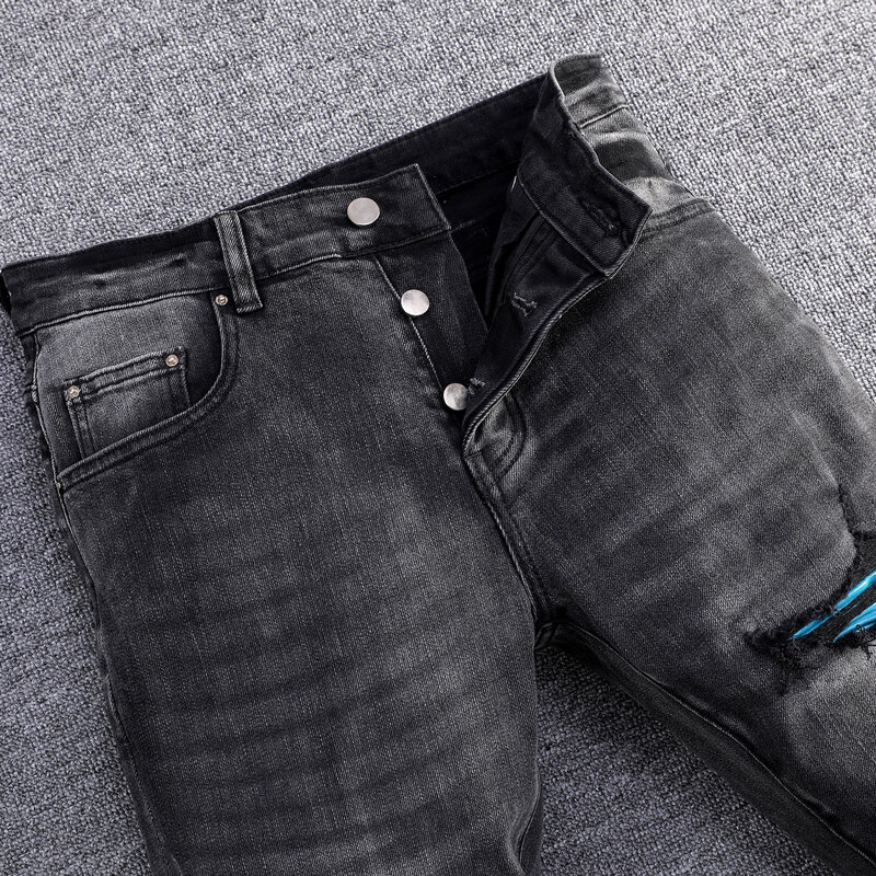 Modne dżinsy męskie uliczna Retro czarny szarego odcinka chudy krój porwane jeansy mężczyzn niebieska skóra załatane designerskie markowe spodnie Hip-hopowe