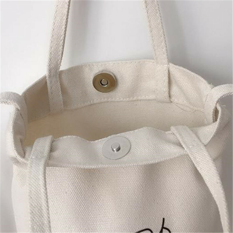 Bolso cruzado pequeño para mujer, bolsa de mano de lona versátil Simple, bolsa de almacenamiento para estudiantes, bolsa de botella de agua de moda
