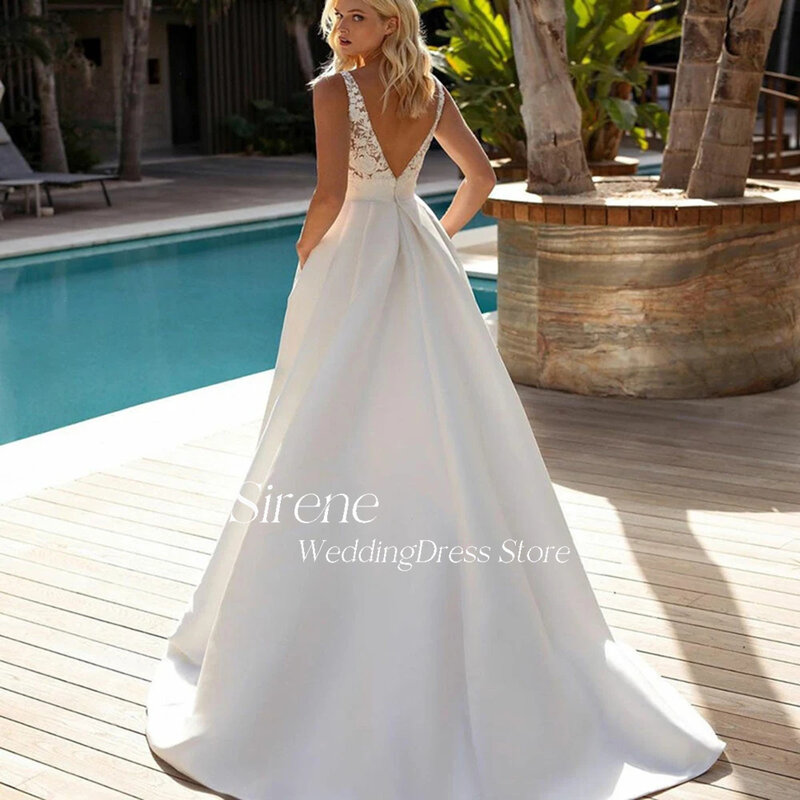 Gaun pernikahan Satin Applique renda pantai Sirene gaun pengantin punggung terbuka tanpa lengan leher V elegan gaun pengantin buatan khusus