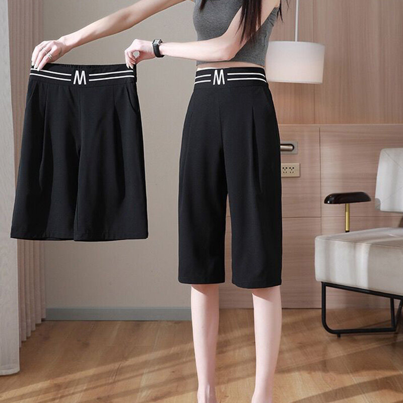 กางเกงเอวสูงผู้หญิง, กางเกงสามส่วนขายาวผ้าไอซ์ซิลค์ทรงหลวมลำลองมีกระเป๋าพิมพ์ลายตัวหนังสือ