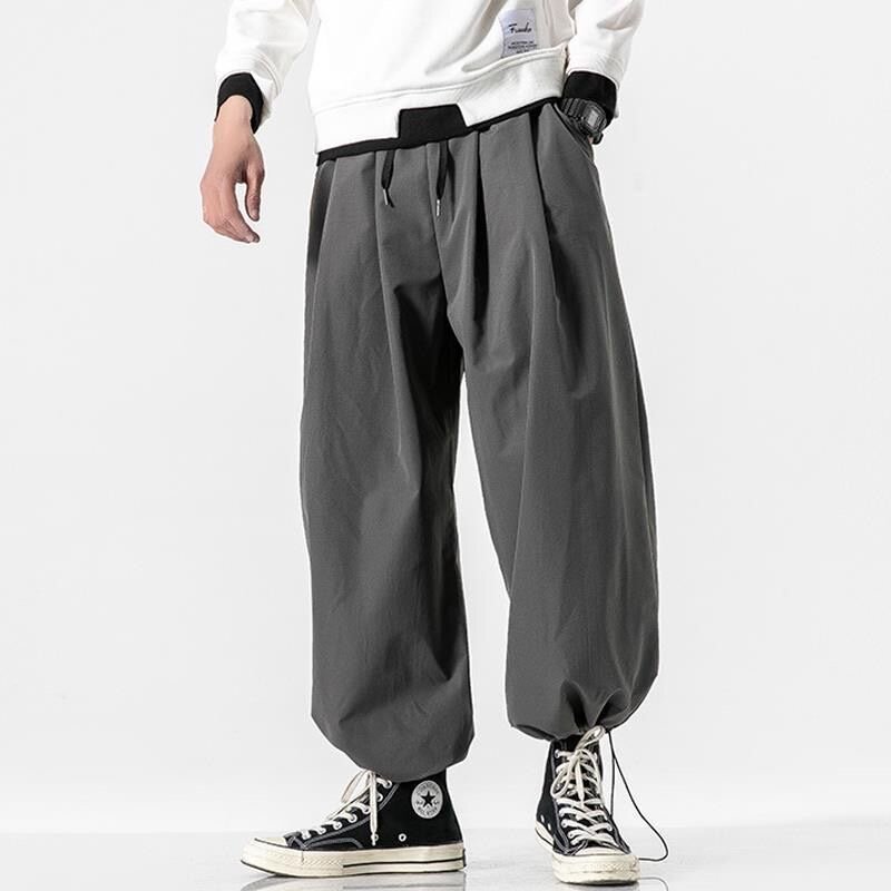 กางเกง5XL กางเกงขายาวลำลองผู้ชายไซส์ใหญ่พิเศษสำหรับผู้ชายกางเกงฮาเร็มสไตล์เกาหลีผู้ชาย