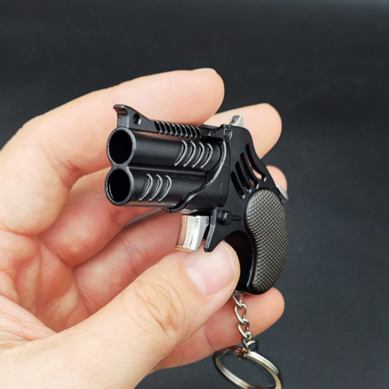 1 pçs edc metal delinger mini pingente dobrável borracha banda arma keychian brinquedos 6-shot elástico macio arma presentes brinquedo
