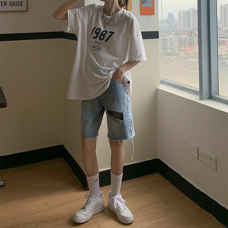 Celana pendek Denim lubang kasual, celana panjang pendek lurus pinggang tinggi, celana panjang pasangan uniseks gaya Korea musim panas