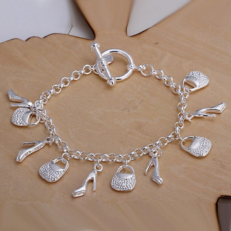 Nuovo regalo di moda per le donne ragazza bella alta qualità colore argento gioielli braccialetti con ciondoli prezzo di fabbrica spedizione gratuita