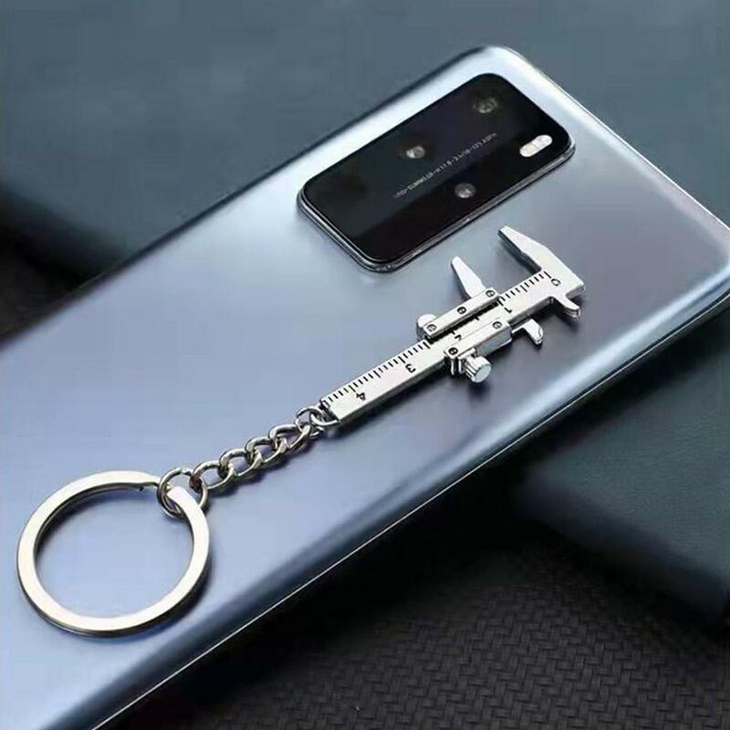 Penggaris Vernier Caliper logam Mini, gantungan kunci kreatif dapat digerakkan Vernier Caliper penggaris Model gantungan kunci hadiah kreatif untuk dewasa