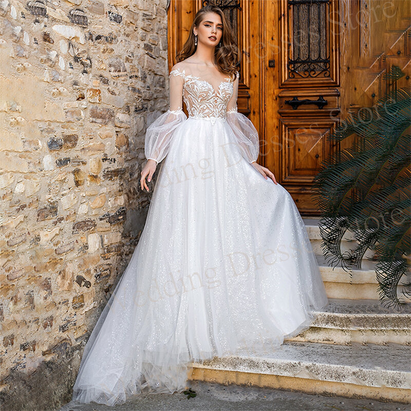 Lśniące tiulowe suknie ślubne kochanie koronkowe aplikacje z koronką z guzikami iluzja suknie ślubne nowoczesne bufiaste rękawy Vestido De Novia