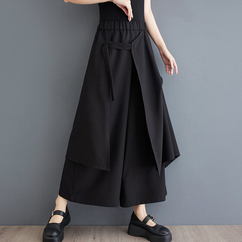 Japońskie ciemny czarny w stylu Yamamoto z wysokim stanem luźne letnie spodnie z szerokimi nogawkami Culotte nieregularne moda uliczna damskie spodnie na co dzień