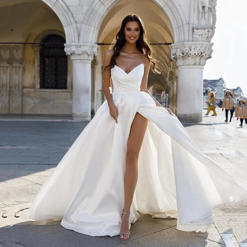 ชุดแต่งงานสีขาวเรียบง่ายคอวีแขนกุดผ้าซาตินแท้ทรงเอไลน์มีจีบสำหรับเจ้าสาวชุดเดรสผ่าข้างเซ็กซี่เดรส Vestidos de Novia