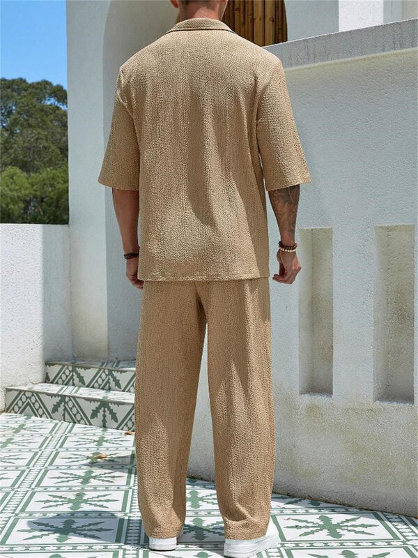 Setelan celana desainer pria, baju lengan pendek dan celana panjang tidak beraturan 2 potong, pakaian longgar warna Solid musim panas untuk pria