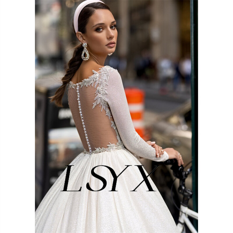 LSYX księżniczka z okrągłym dekoltem z błyszczące długie rękawem suknia ślubna z aplikacjami guzik iluzji z kokardą z tyłu sukni ślubnej z traingiem