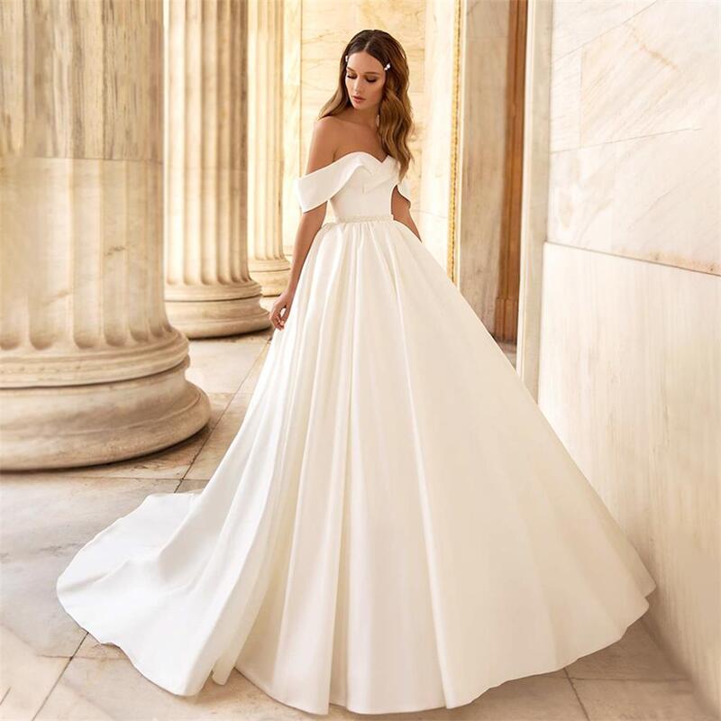 Gaun pernikahan bahu terbuka Tulle populer gaun pengantin tanpa lengan seksi baru diluncurkan dengan panjang pel Backless Vestidos De Novia